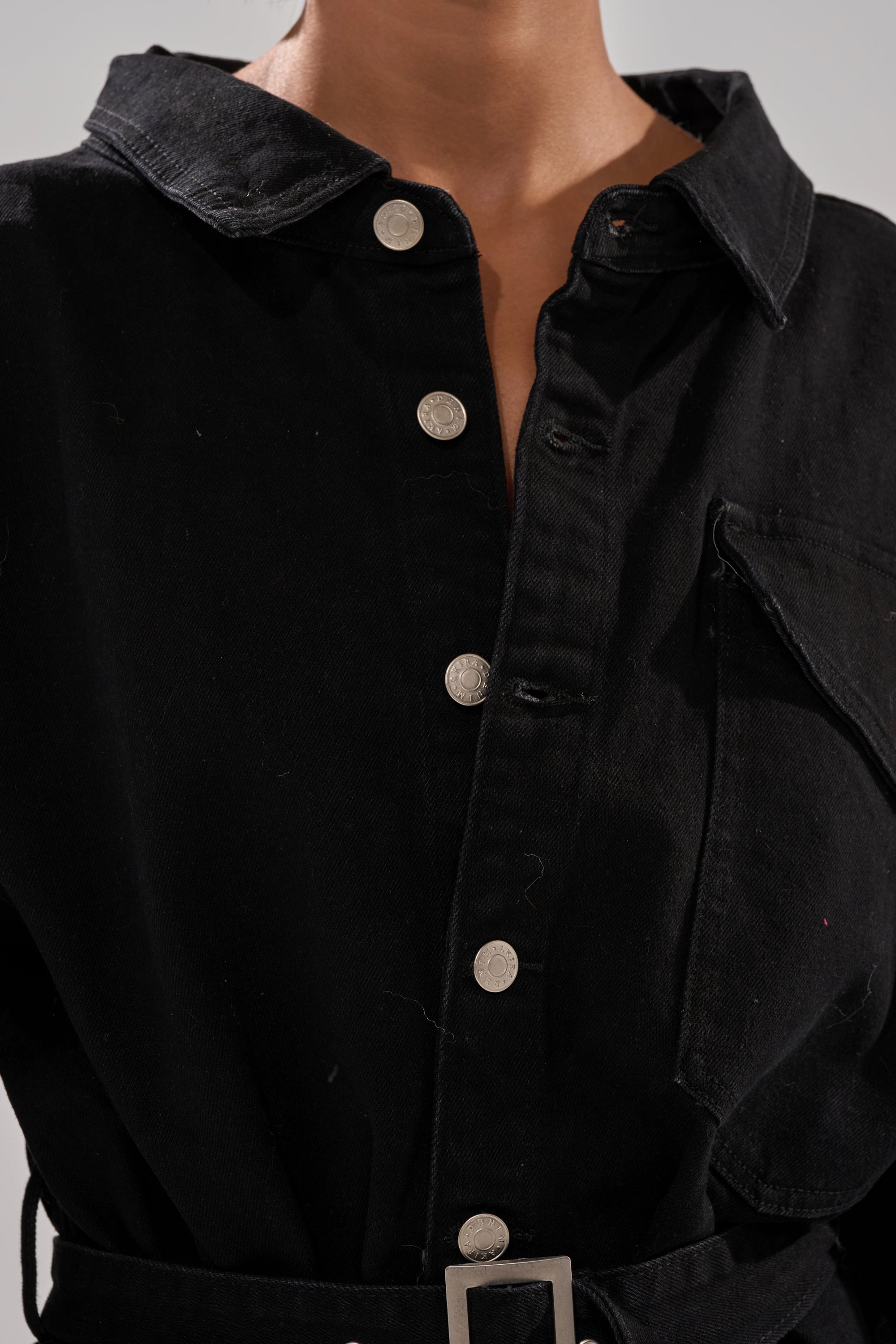 PLAY YOUR CARDS RIGHT DENIM JUMPSUIT WITH GROMMETS
