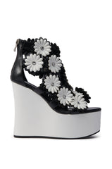 AZALEA WANG FLOWER EMBELLISHED WEDGE SANDAL IN BLACK