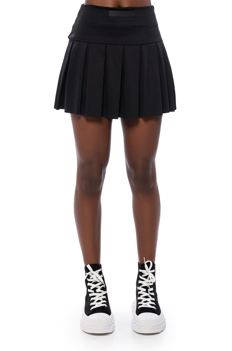 ITS THE PAXTON LUXE PLEATED SKORT IN BLACK