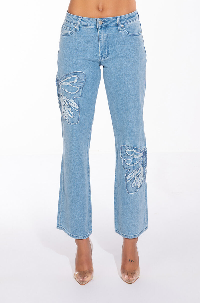 INFINITY BUTTERFLY DETAIL MID RISE WIDE LEG DENIM