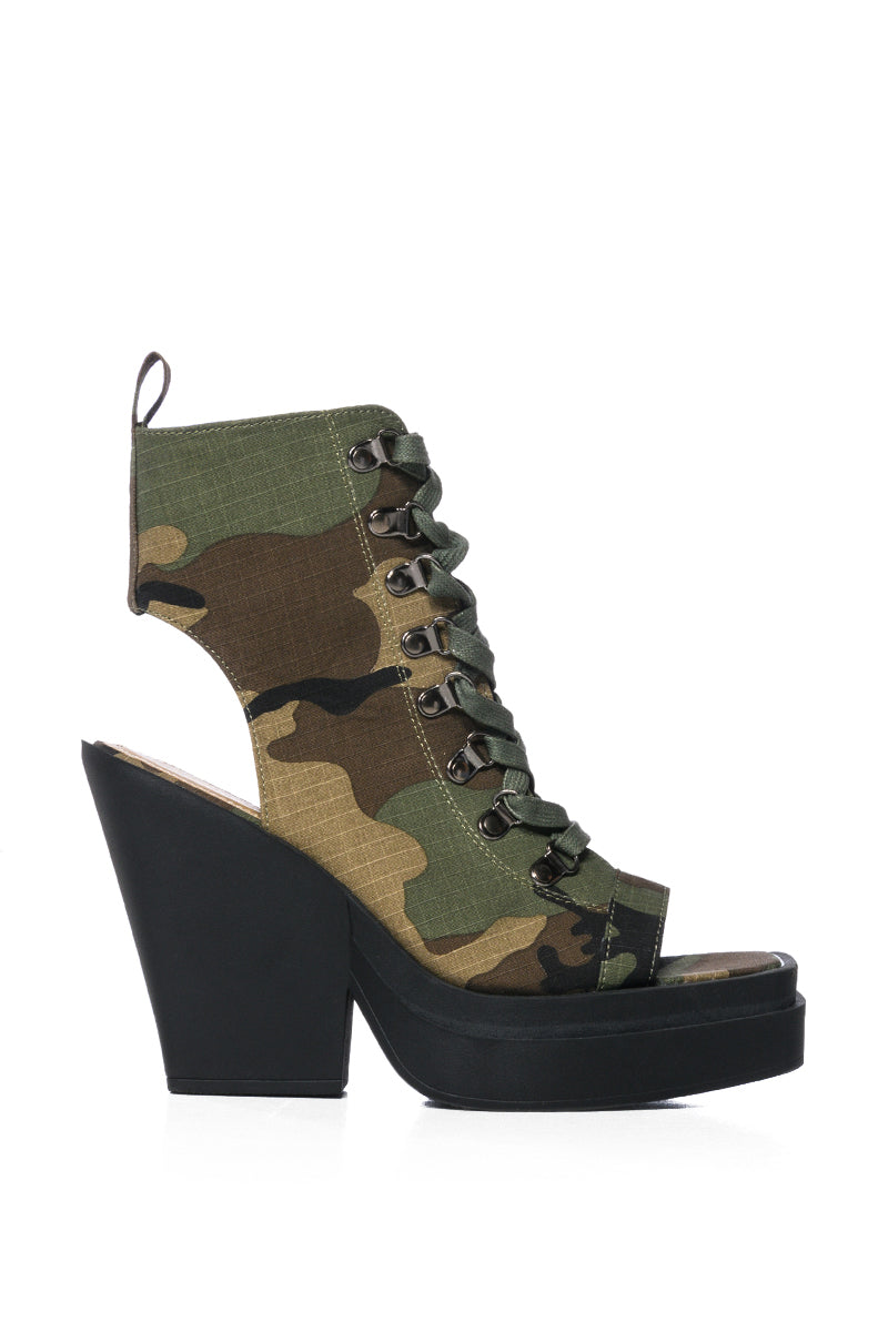 OFF DUTY PEEP TOE BOOTIE IN CAMO