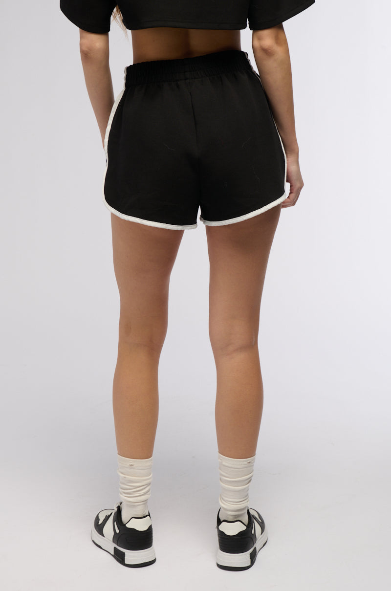 ON POINT STRIPED MINI SHORTS IN BLACK