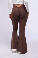 ON THE RUN RUCHED BACK FLARE LEGGING IN BROWN